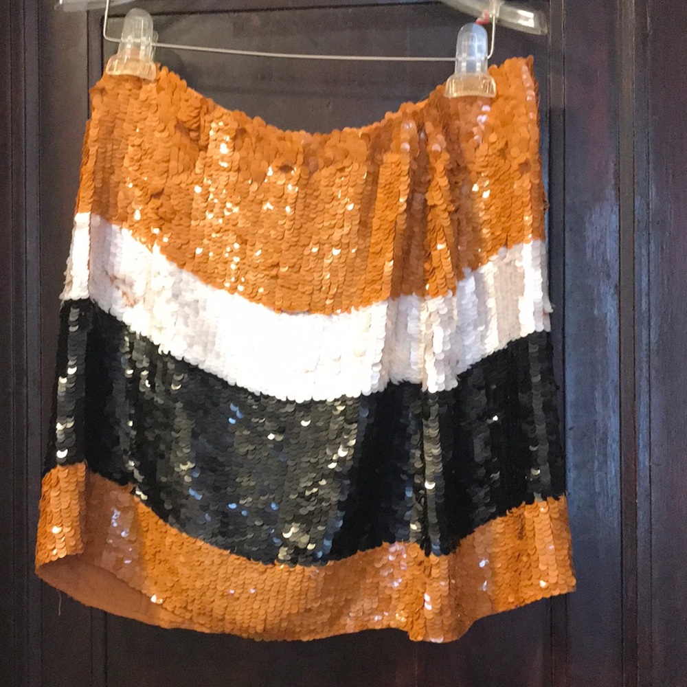 26.  Mini black, white, dark yellow sequined dress